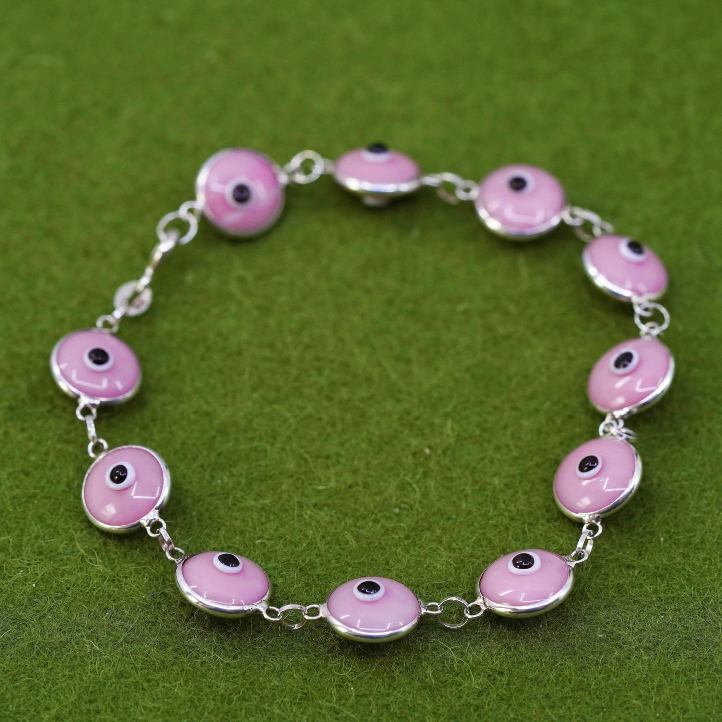6.75”, vintage handmade sterling silver bracelet, pink glass evil eye beads