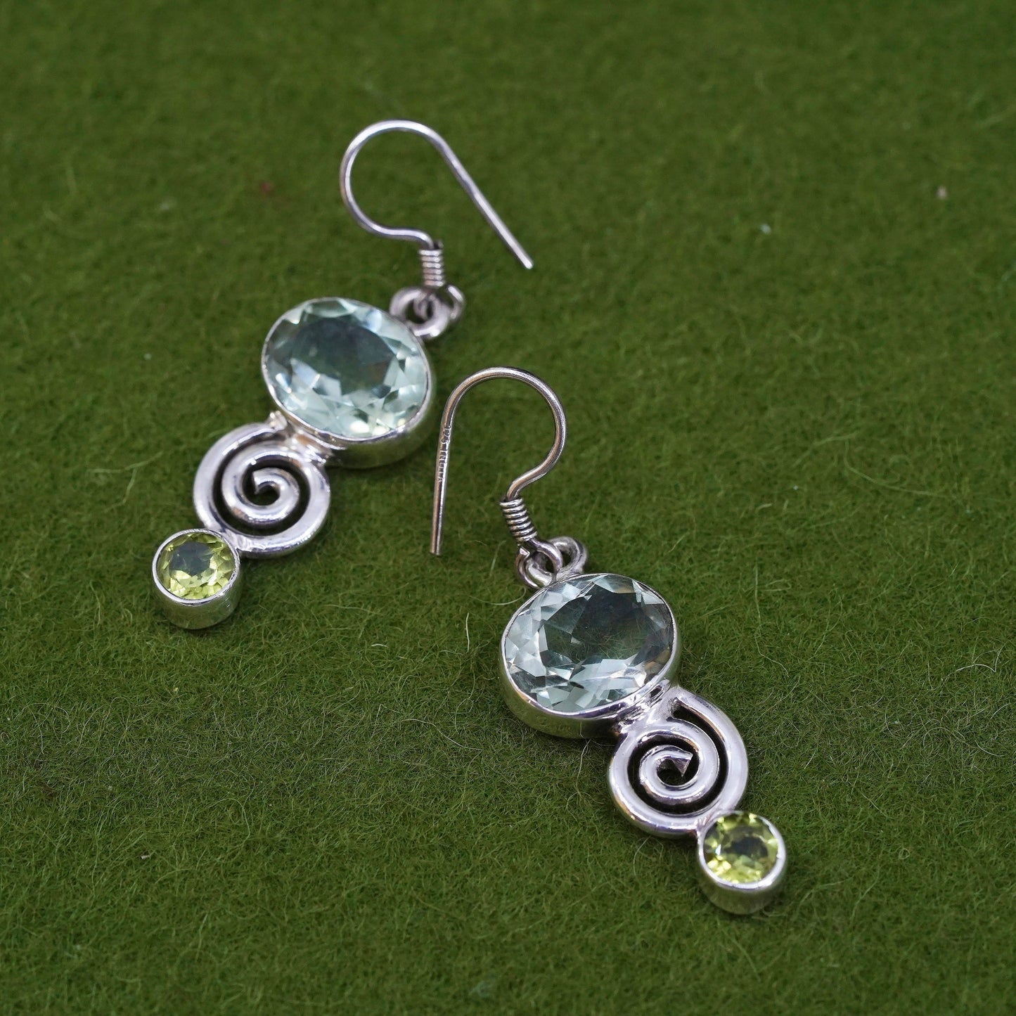 Vintage sterling 925 silver handmade earrings with peridot and spiral details