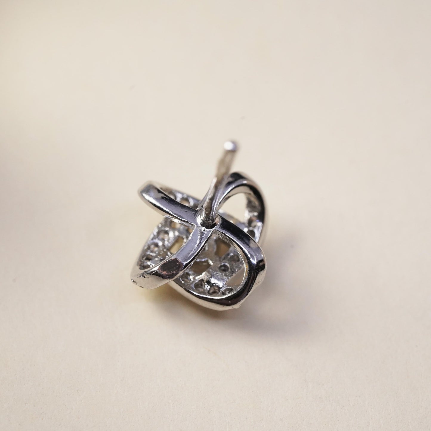 Vintage handmade single earring. Sterling 925 silver cz entwinted stud