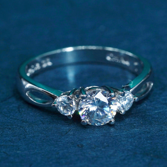 Size 7, vintage Sterling 925 silver engagement ring with cluster Cz around