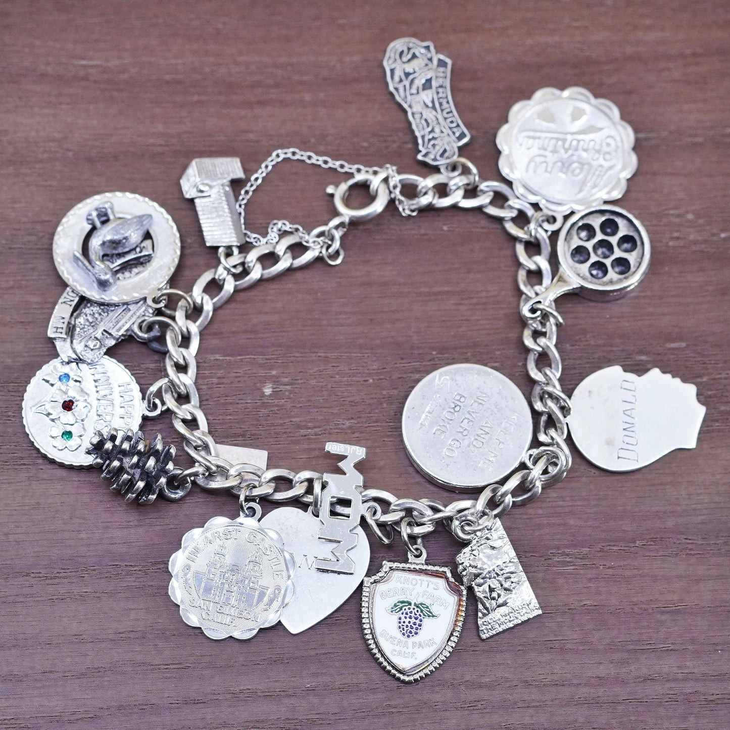 7”, vintage Sterling silver handmade bracelet, 925 curb chain with 15 charms
