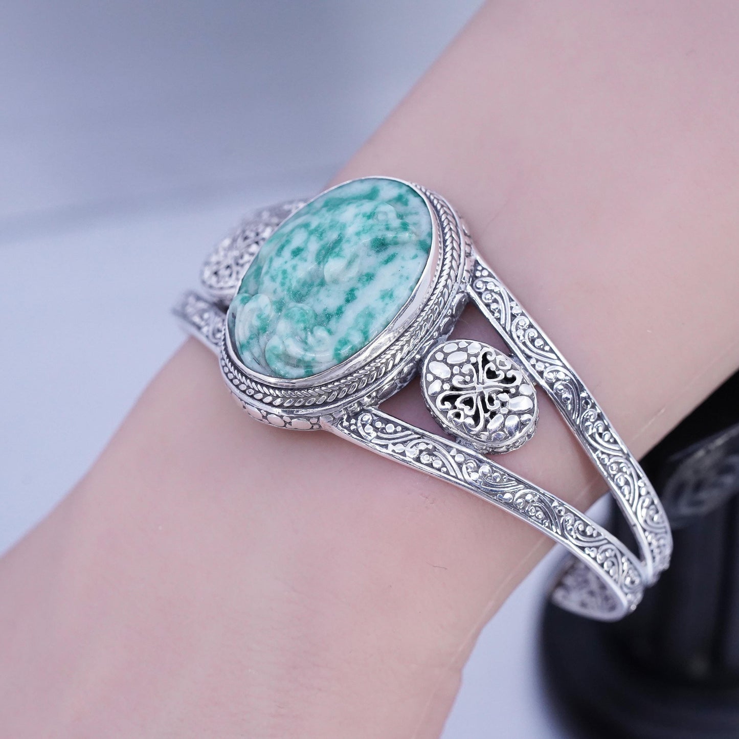 7.5”, Navajo Sandra Sterling 925 silver bracelet, cuff carved dolphin jade