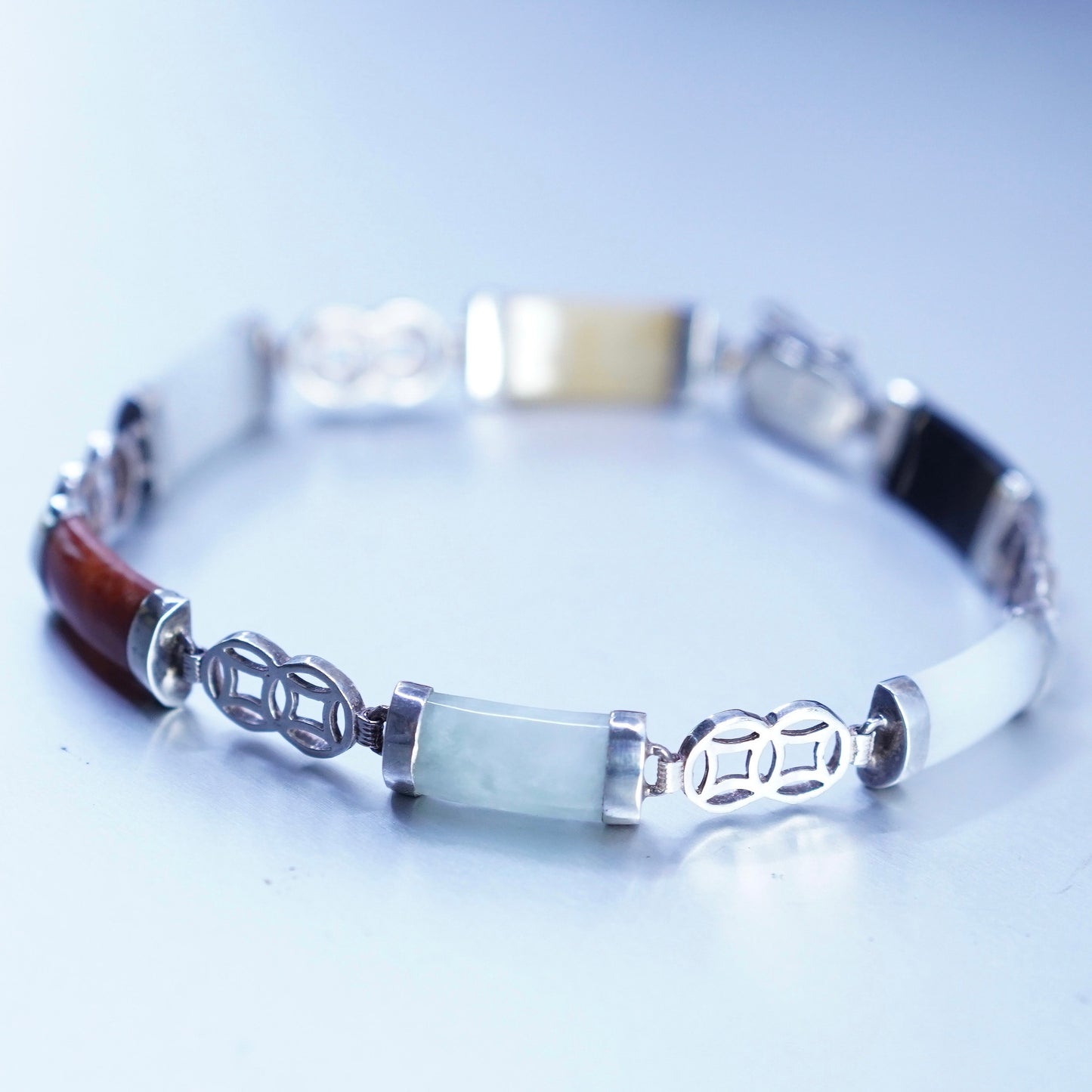 7.25”, sterling 925 silver bracelet with jade, carnelian, obsidian marcasite