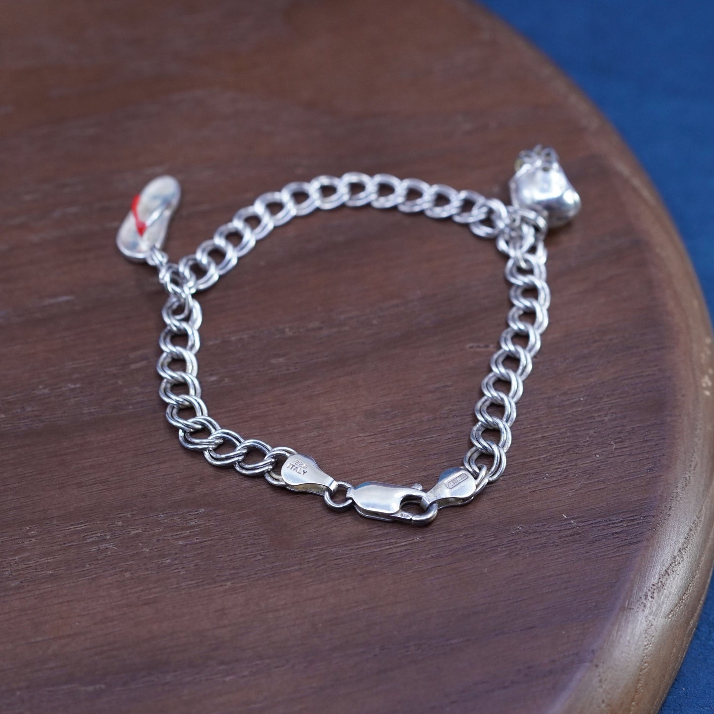 7.5”, Vtg Sterling silver 925 bracelet, curb chain football, flip-flop charms