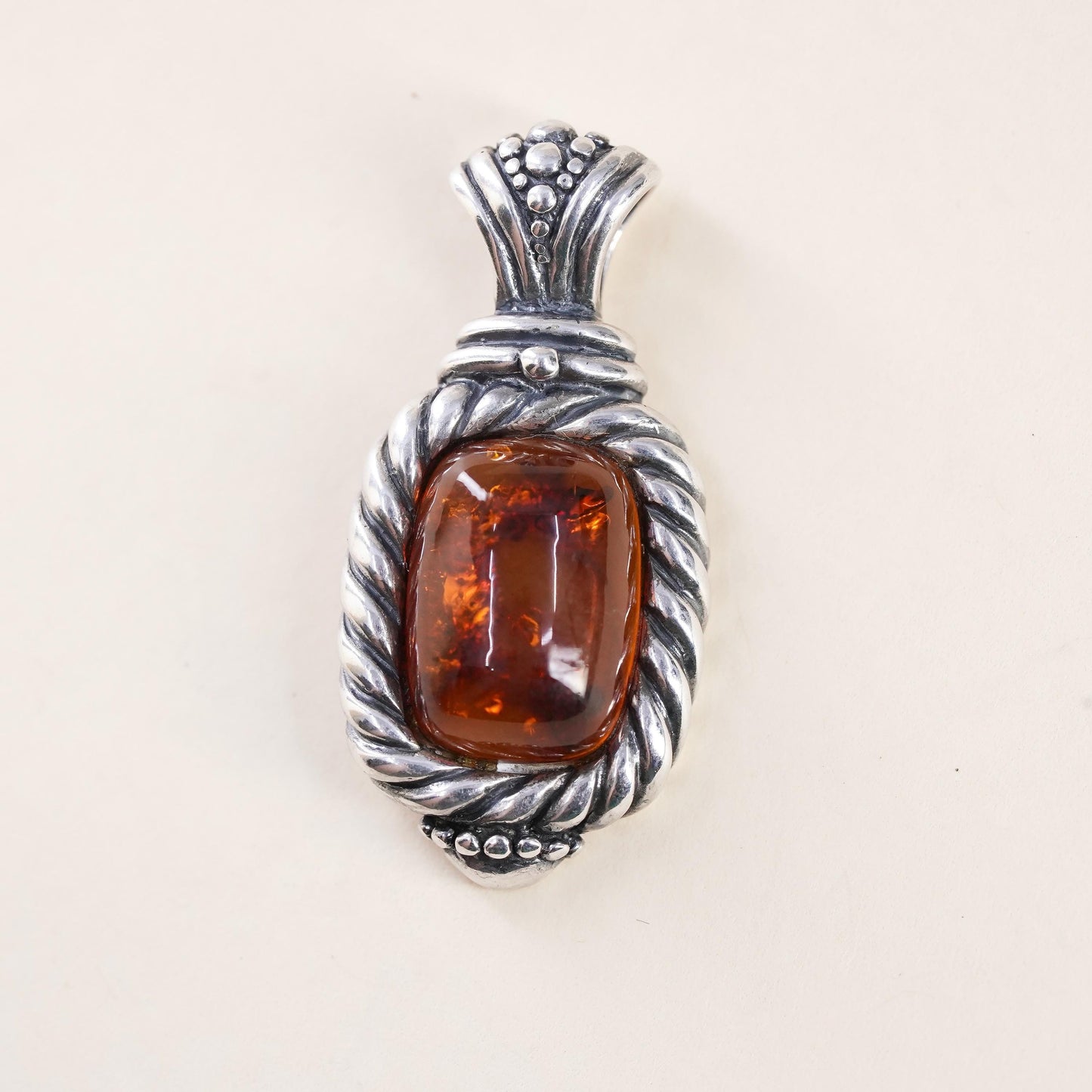 Vintage Sterling 925 silver handmade pendant with amber and cable around