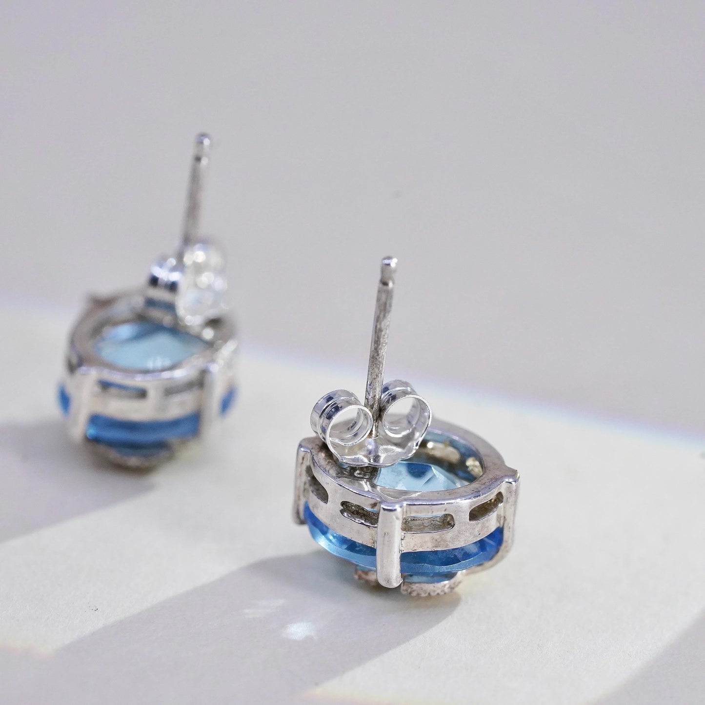 Vintage Sterling silver earrings, 925 studs with blue topaz and leaves