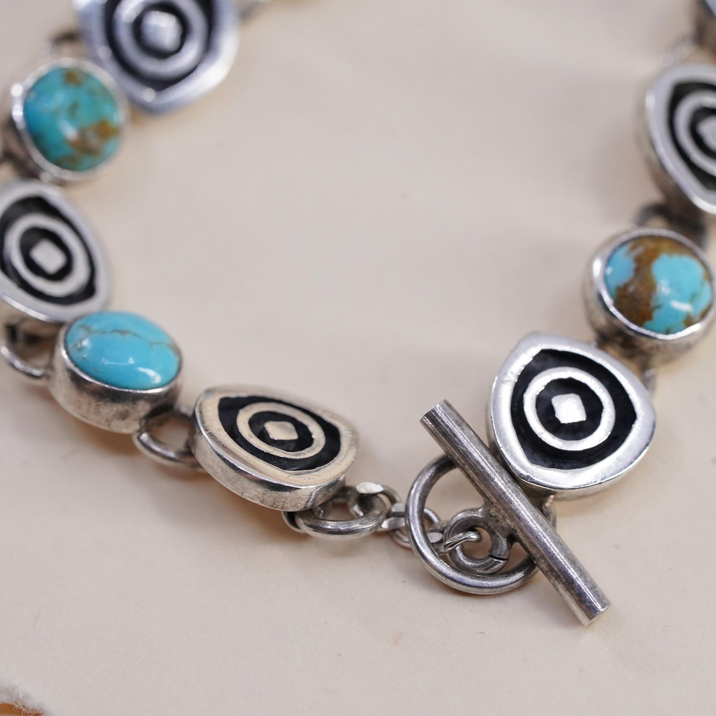 6.75”, southwestern Sterling 925 silver bracelet w/ turquoise beads and spiral