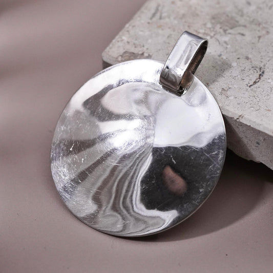 Vintage Robert Lee Morris Studio handmade One World pendant, 925 circle disc