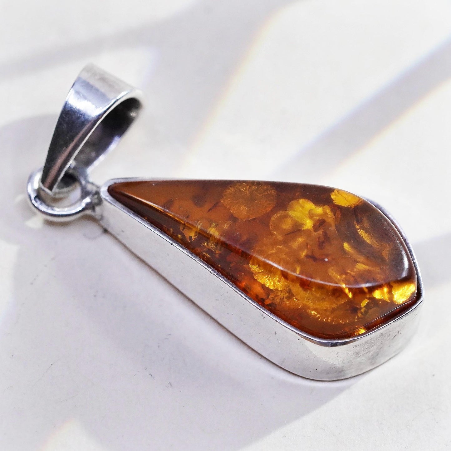 Vintage sterling 925 silver handmade pendant with amber nugget