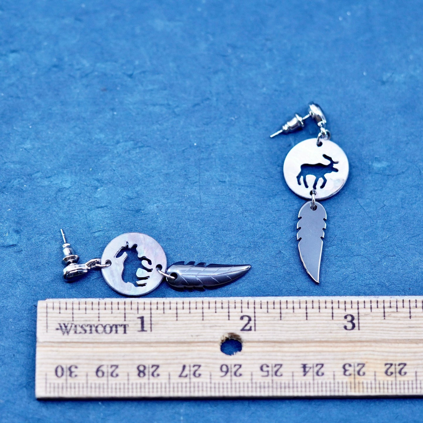 Silver Tone handmade earrings with abalone elk cut out hematite feather dangles