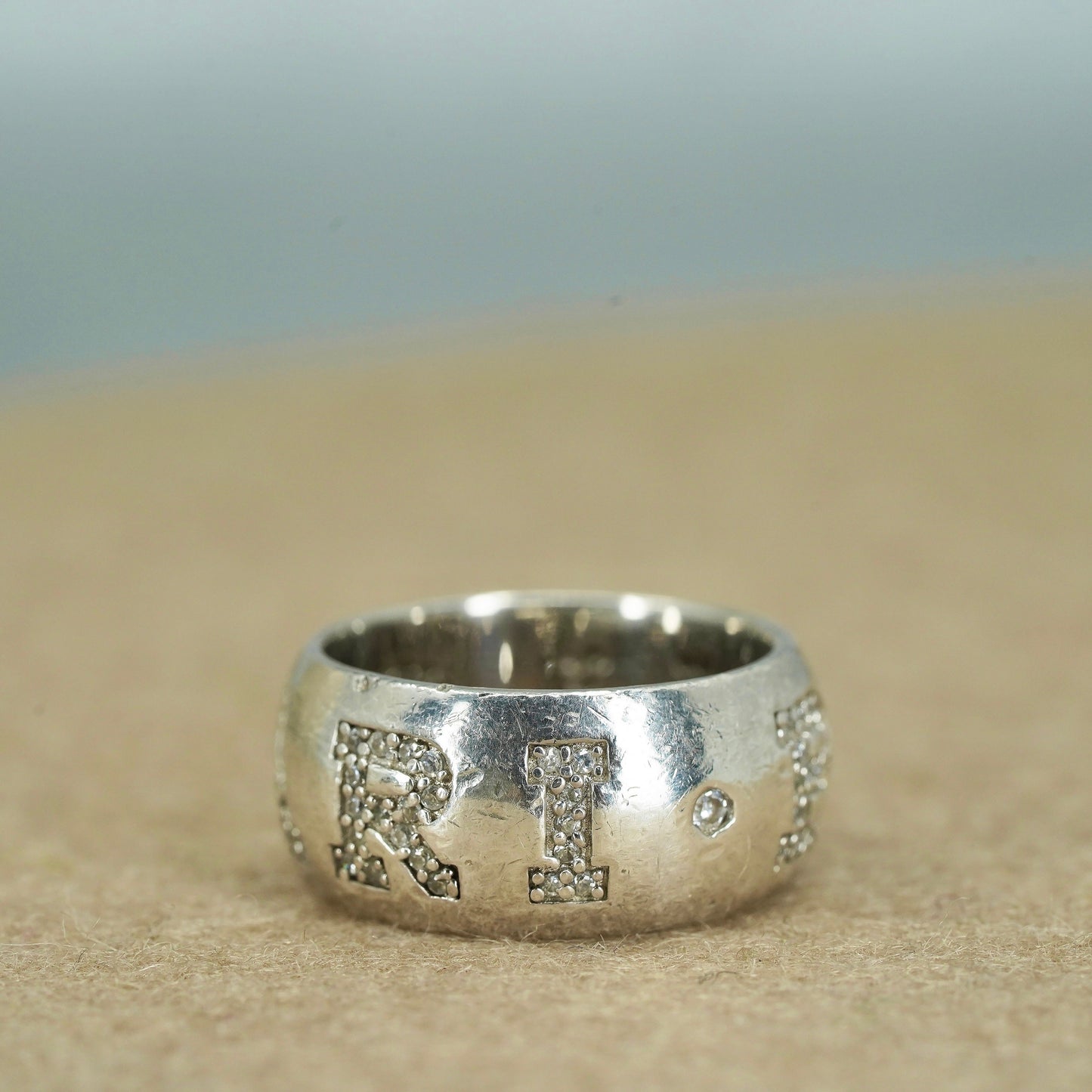Size 7, VTG southwestern Sterling 925 silver wedding ring, Cz “bvlgari” band