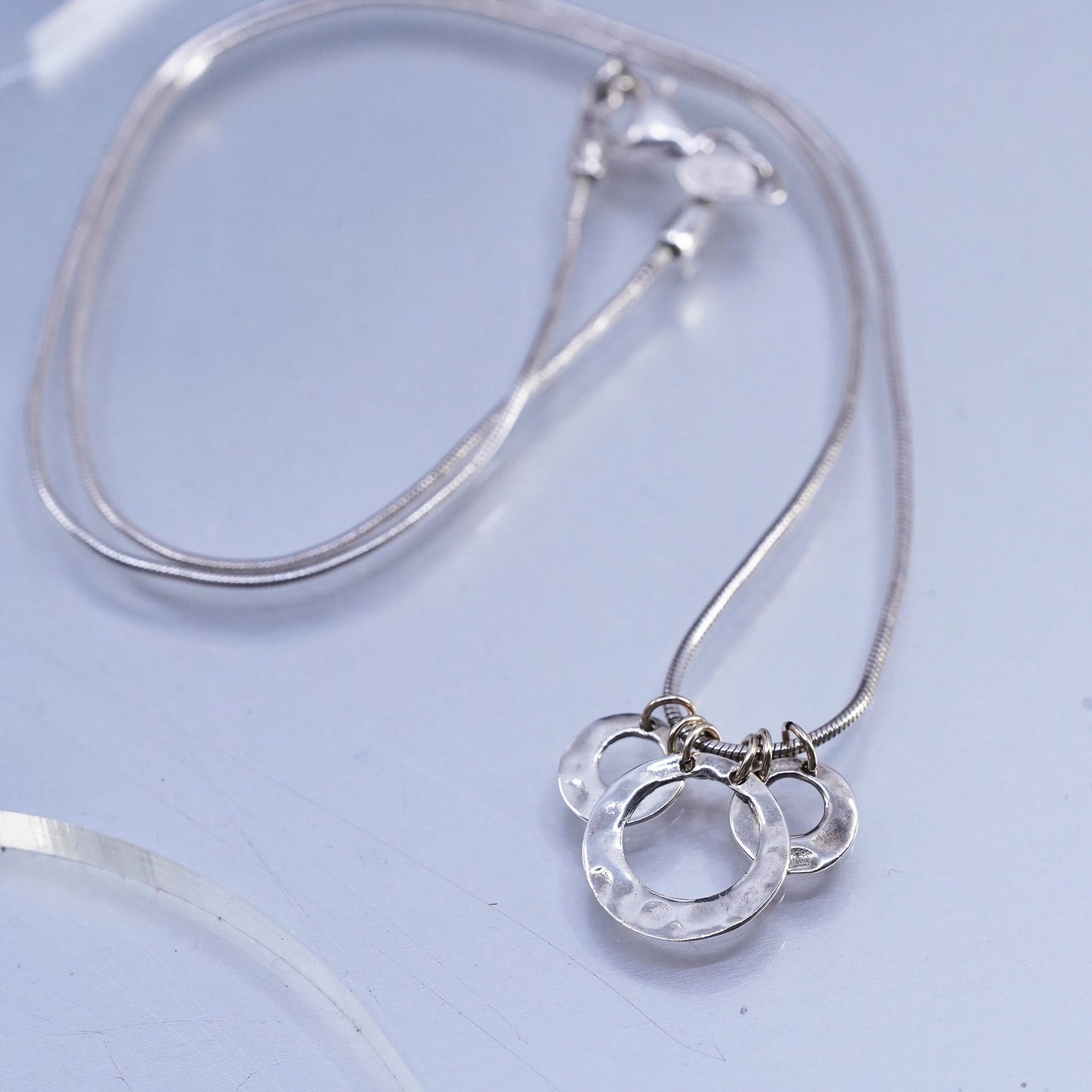 18", Brighton Sayan Sterling Silver snake Necklace and hammered circle pendant