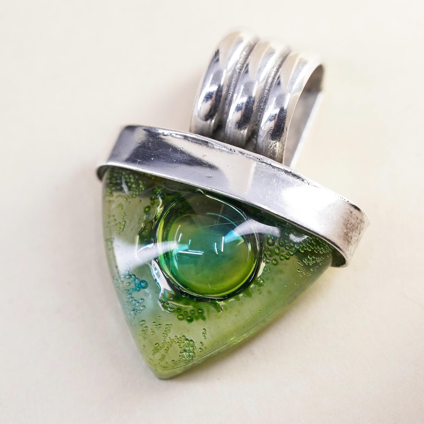 Vintage sterling silver with triangular green dichroic foiled glass pendant
