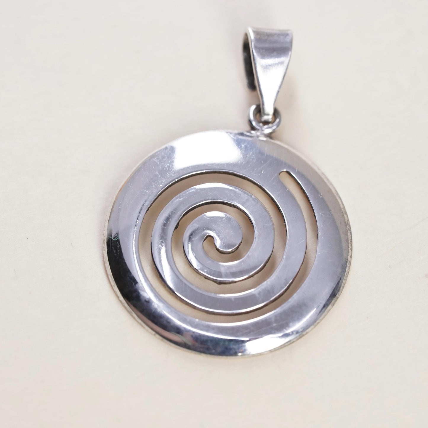 Vintage handmade Sterling silver pendant, 925 circle tag with spiral cut out