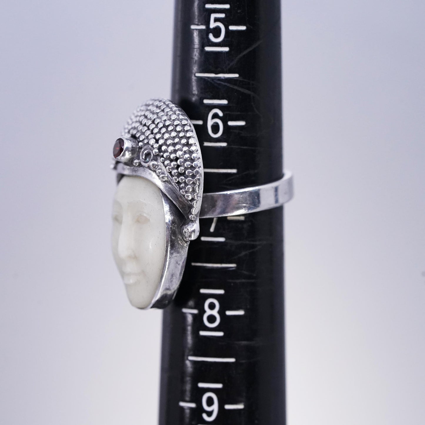 Size 7.5, vintage Sterling 925 silver ring with carved goddess face and garnet
