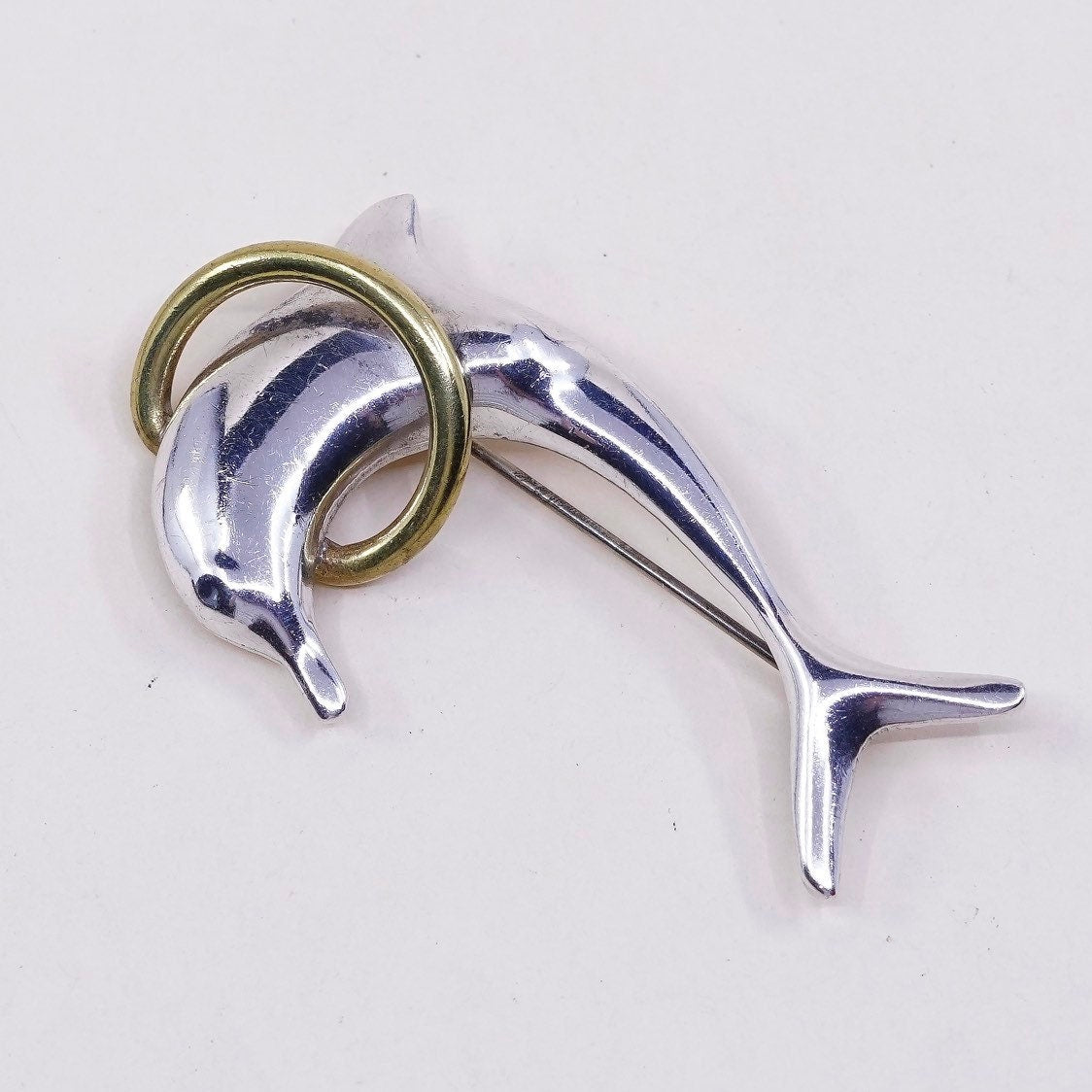 Vintage two Tone sterling silver handmade brooch, solid 925 silver dolphin w/ brass ring, stamped 925 mexico