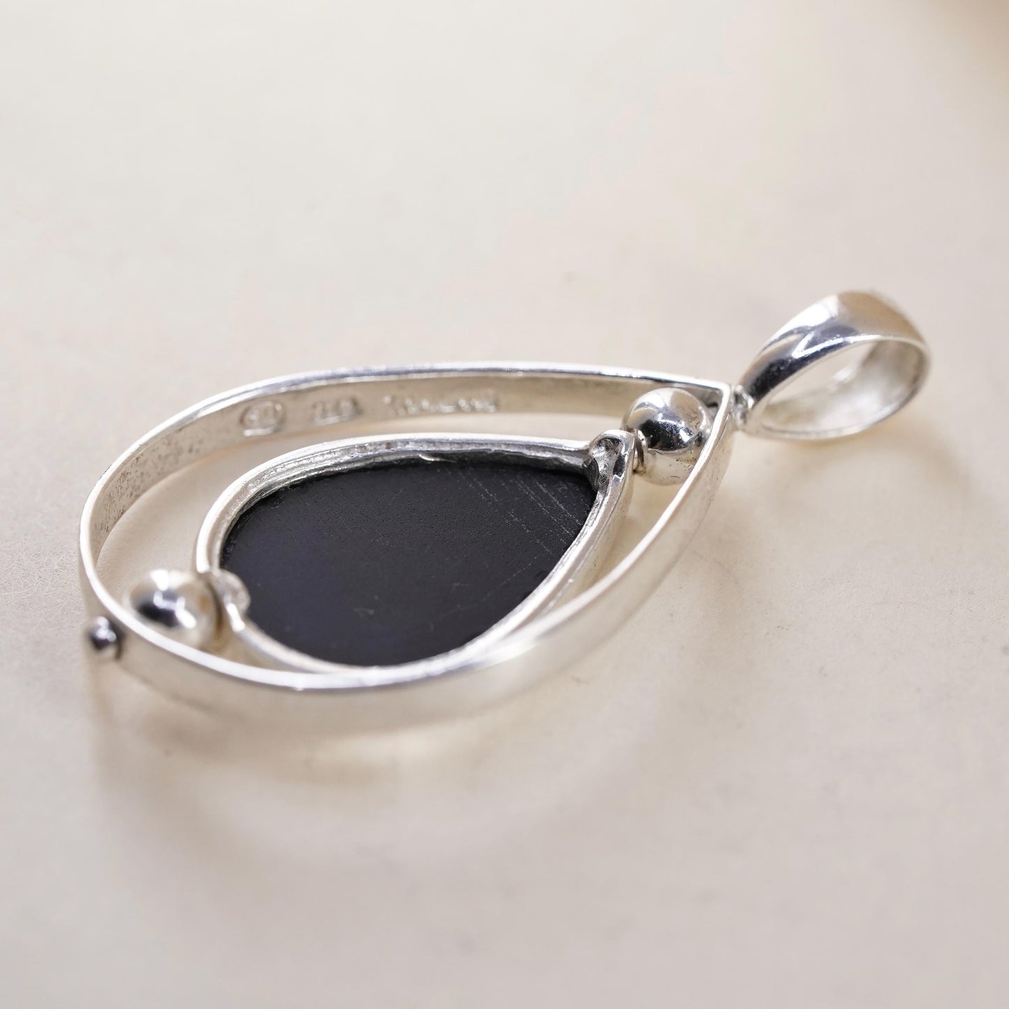 vintage handmade sterling 925 silver spinner teardrop pendant with black onyx