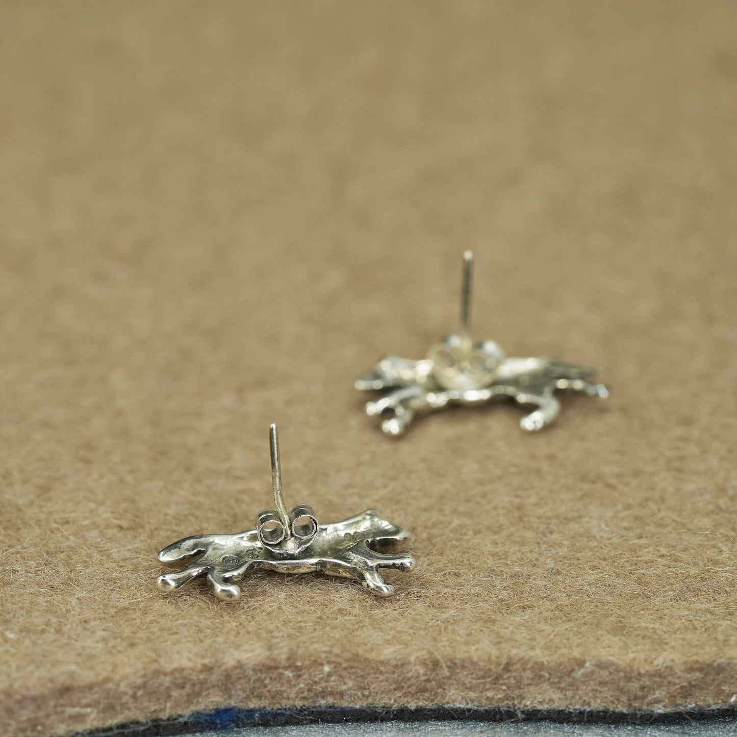 Vintage southwestern Sterling 925 silver handmade star earrings, wolf studs