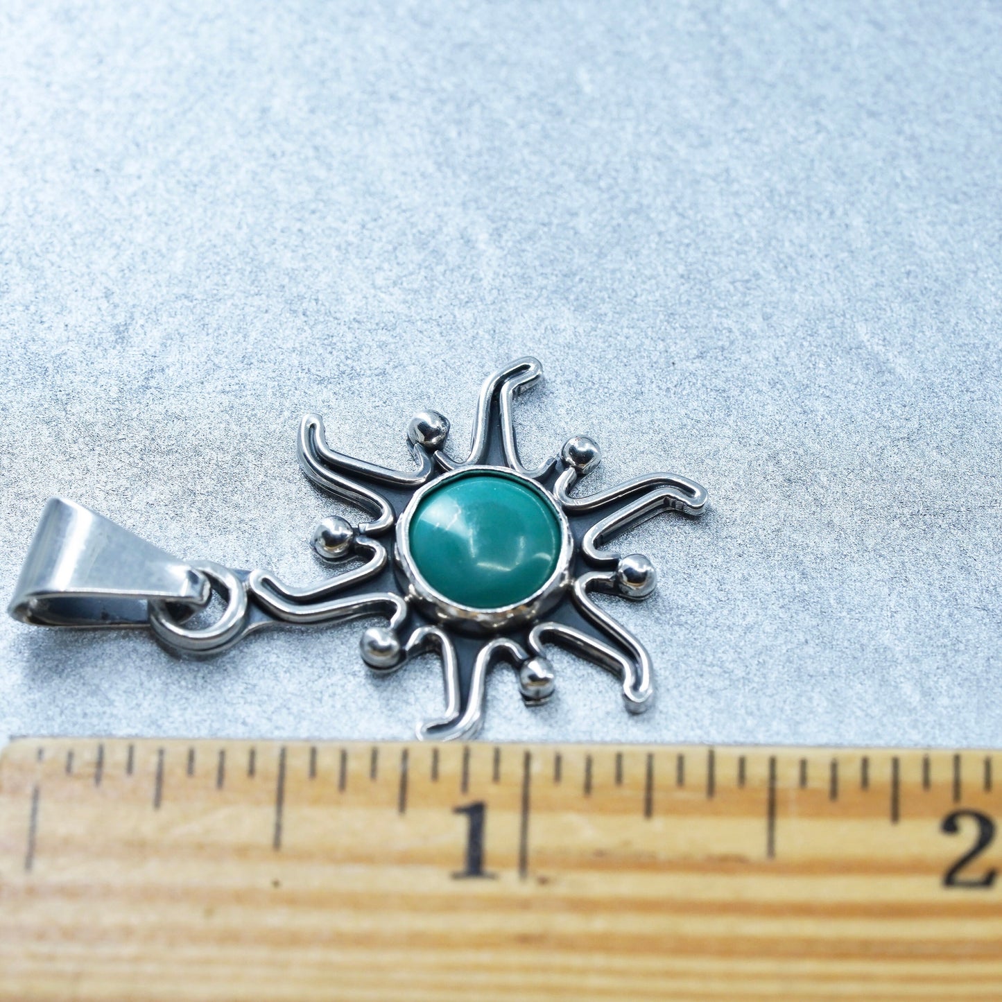 vintage Native American sterling 925 silver sun pendant with turquoise