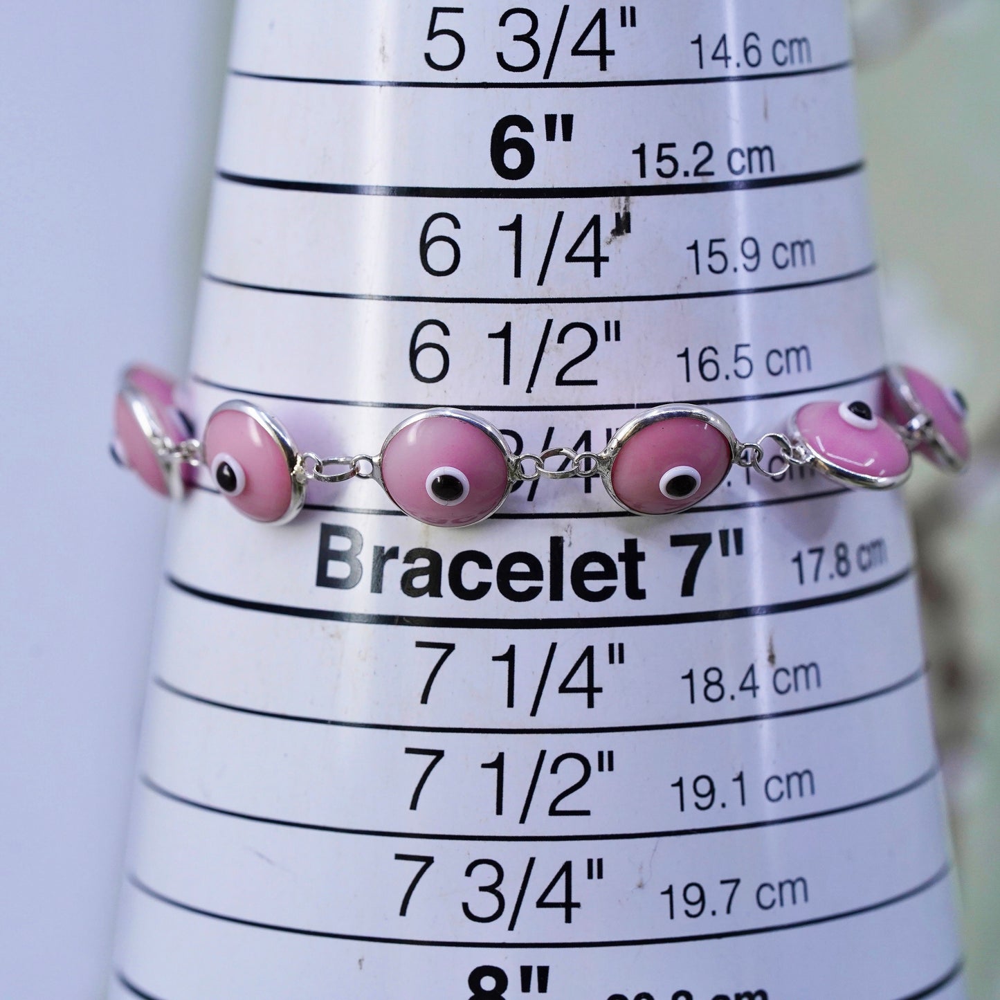 6.75”, vintage handmade sterling silver bracelet, pink glass evil eye beads