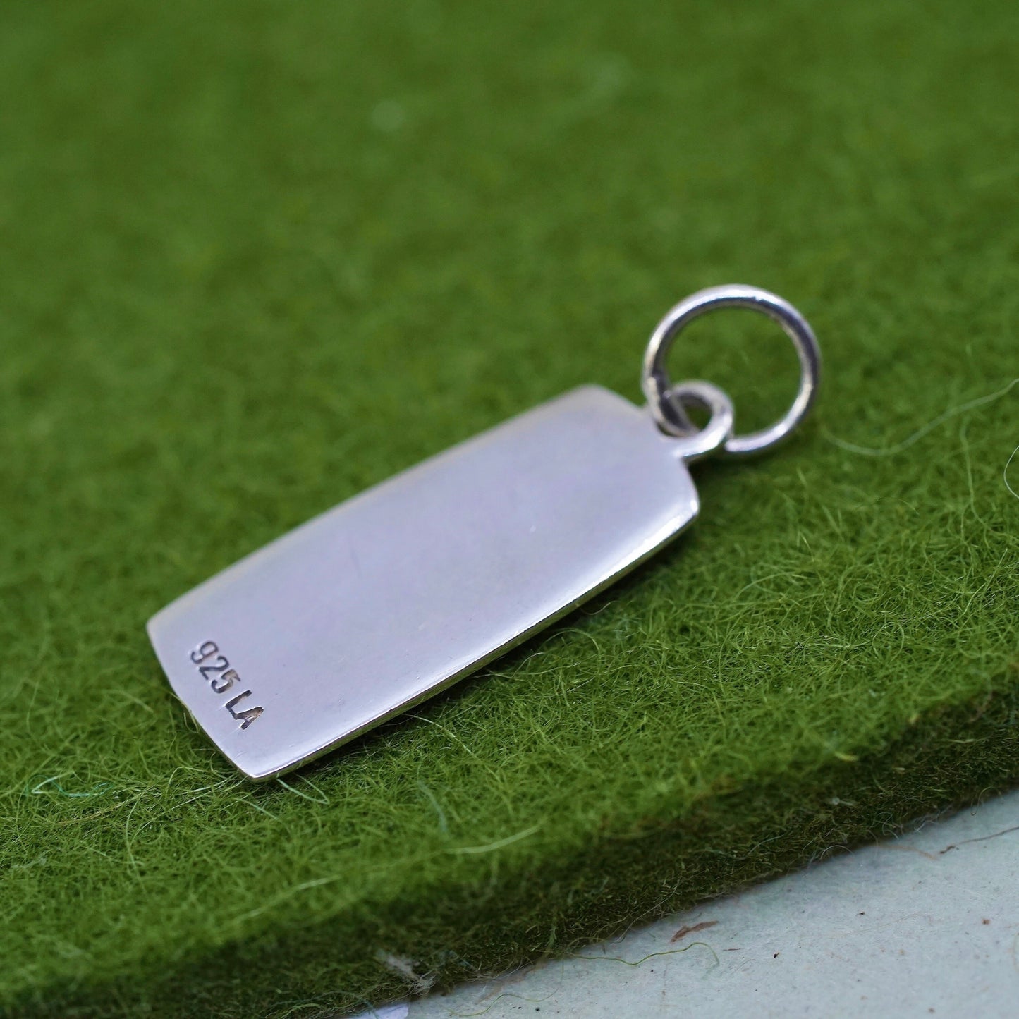 Vintage sterling silver charm, 925 silver tag with "believe" embossed