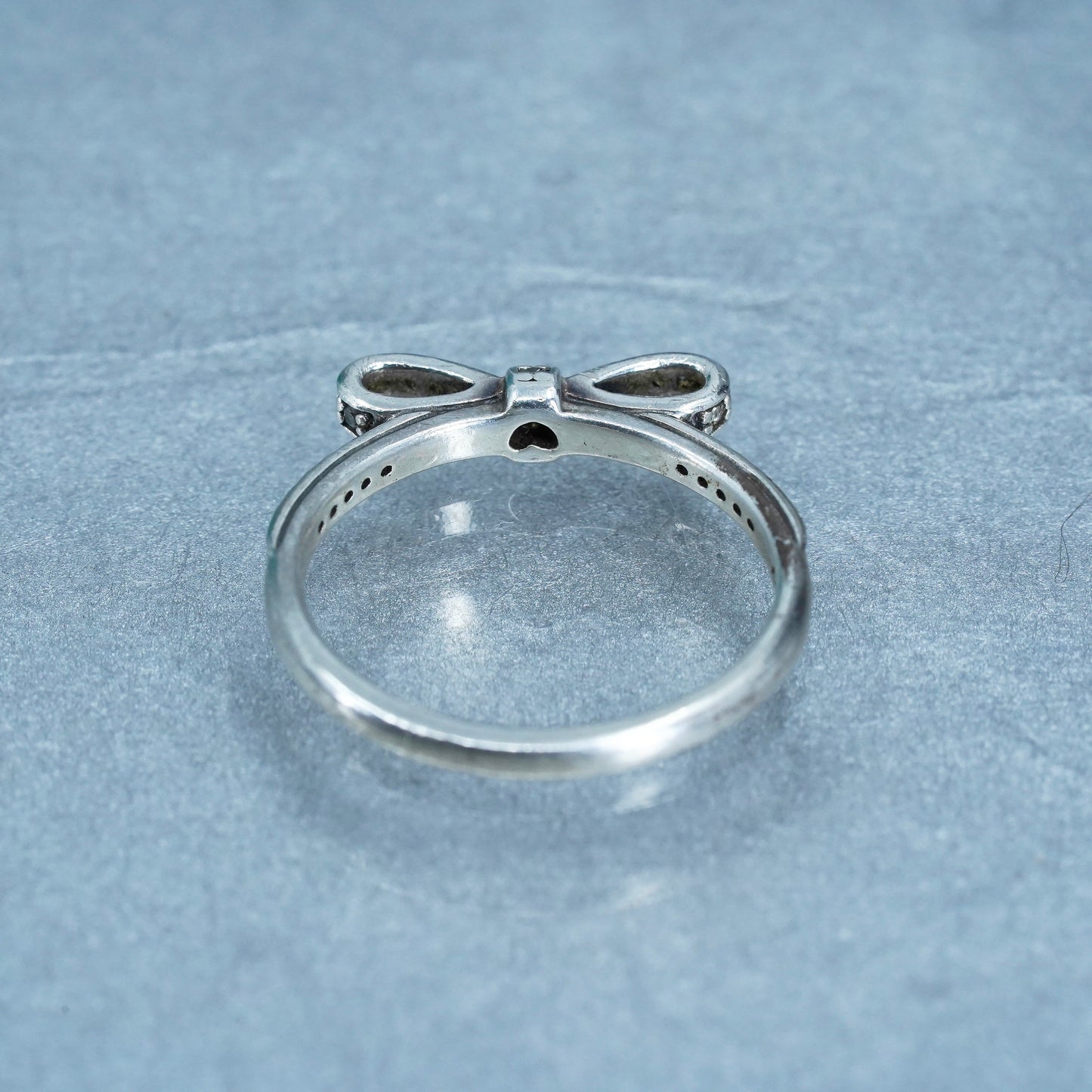 Size 7.25, ALE fashionable Sterling 925 silver ribbon ring w/ cluster cz, band