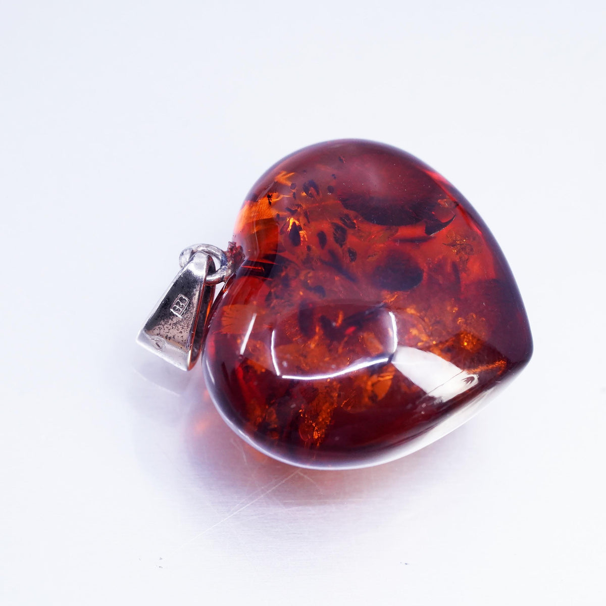 Vintage sterling 925 silver handmade pendant with heart amber
