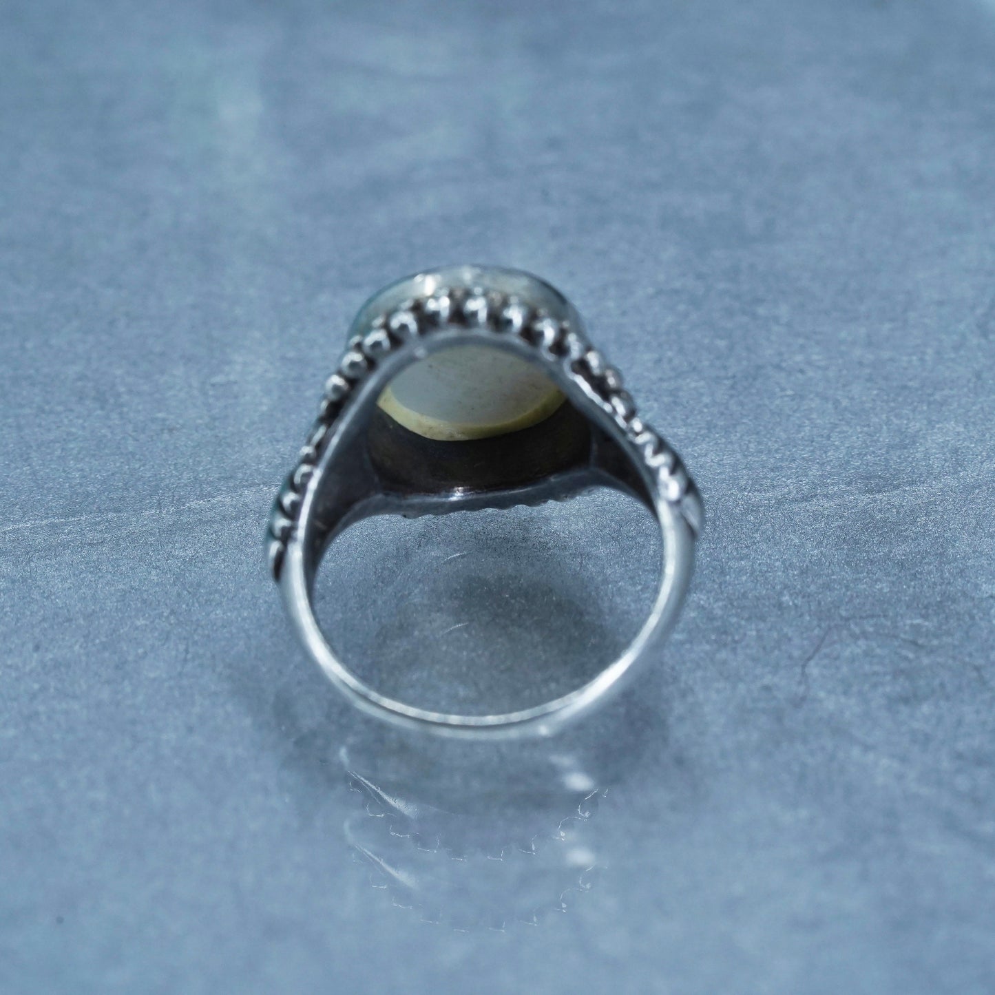 Size 7.5, southwestern Sterling 925 silver ring with mother of pearl and beads
