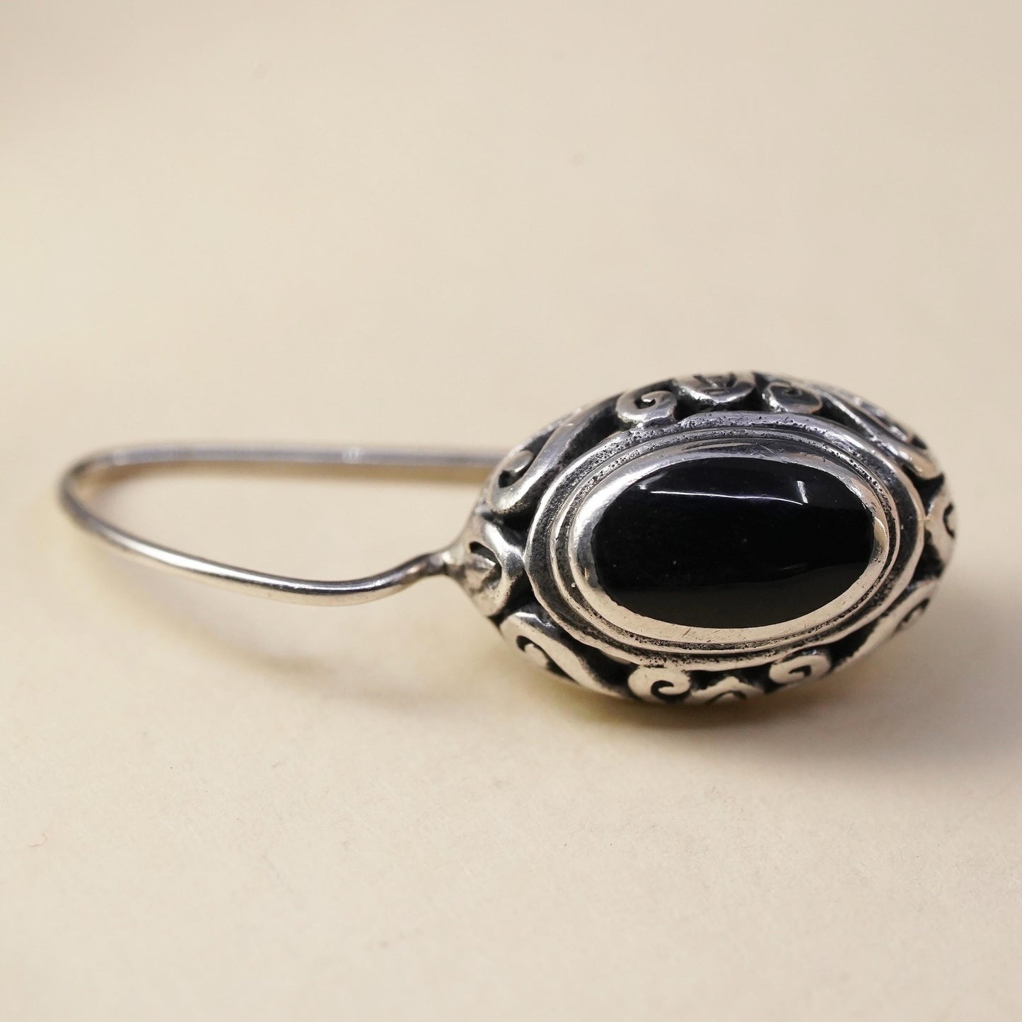 Vintage handmade single earring. Sterling 925 silver oval with onyx inlay