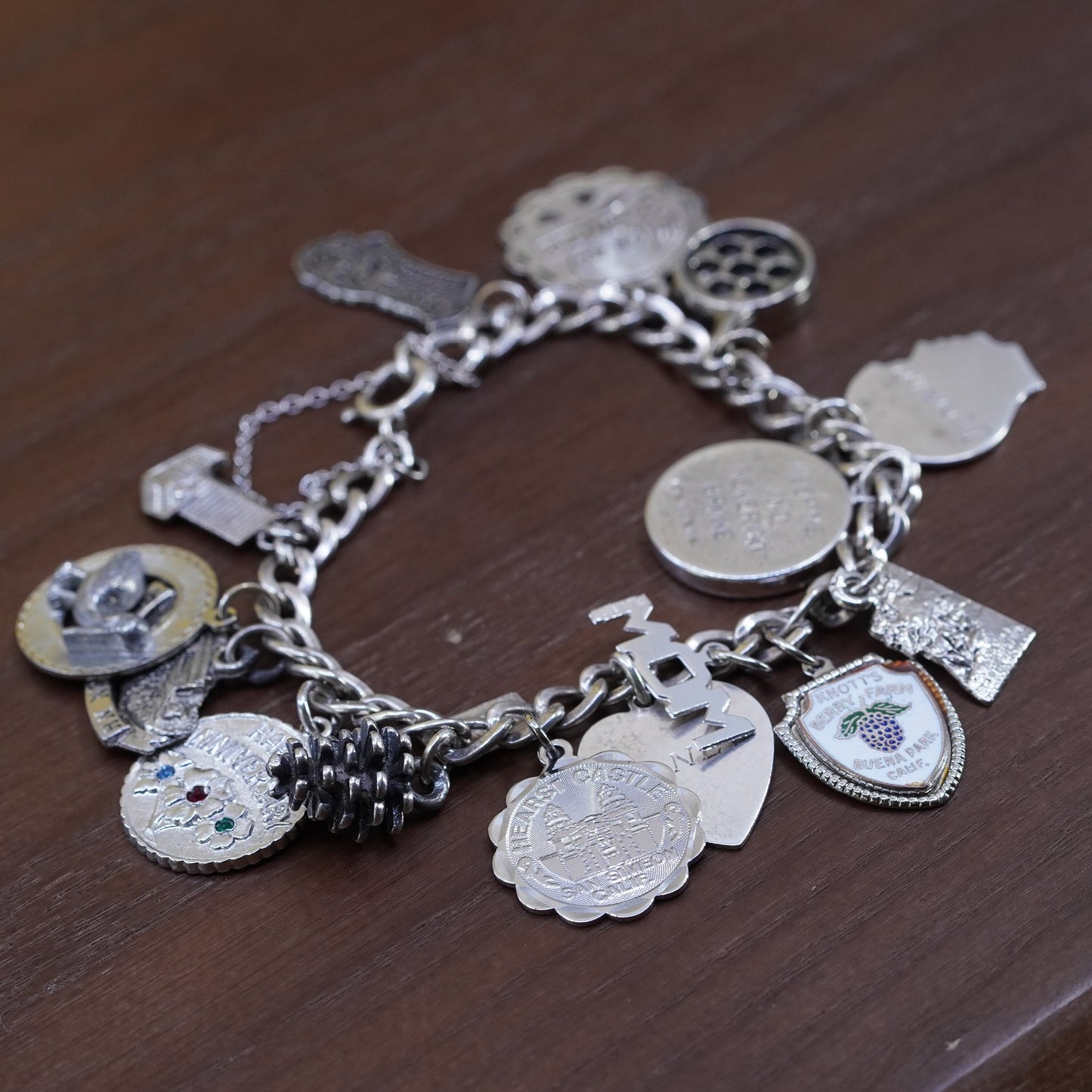 7”, vintage Sterling silver handmade bracelet, 925 curb chain with 15 charms