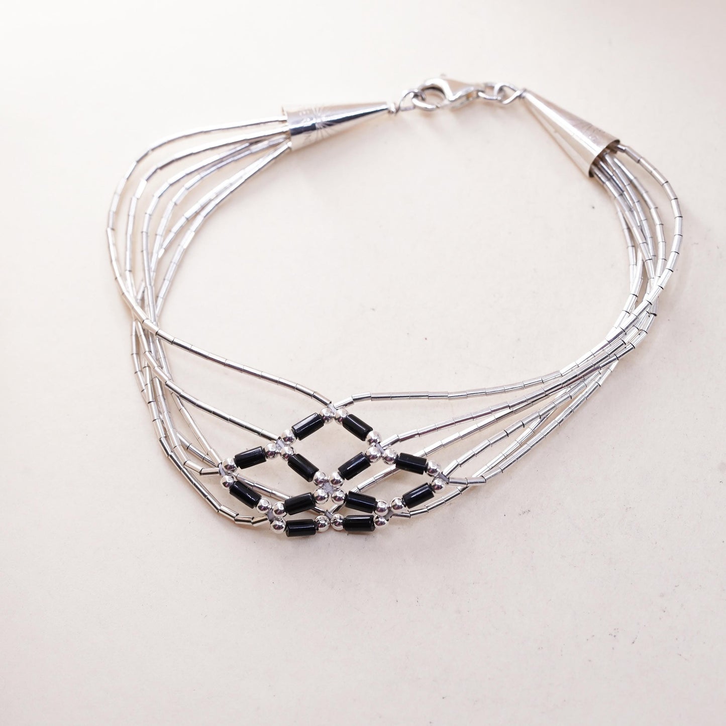 7”, Native American sterling bracelet, woven braided 925 liquid silver onyx