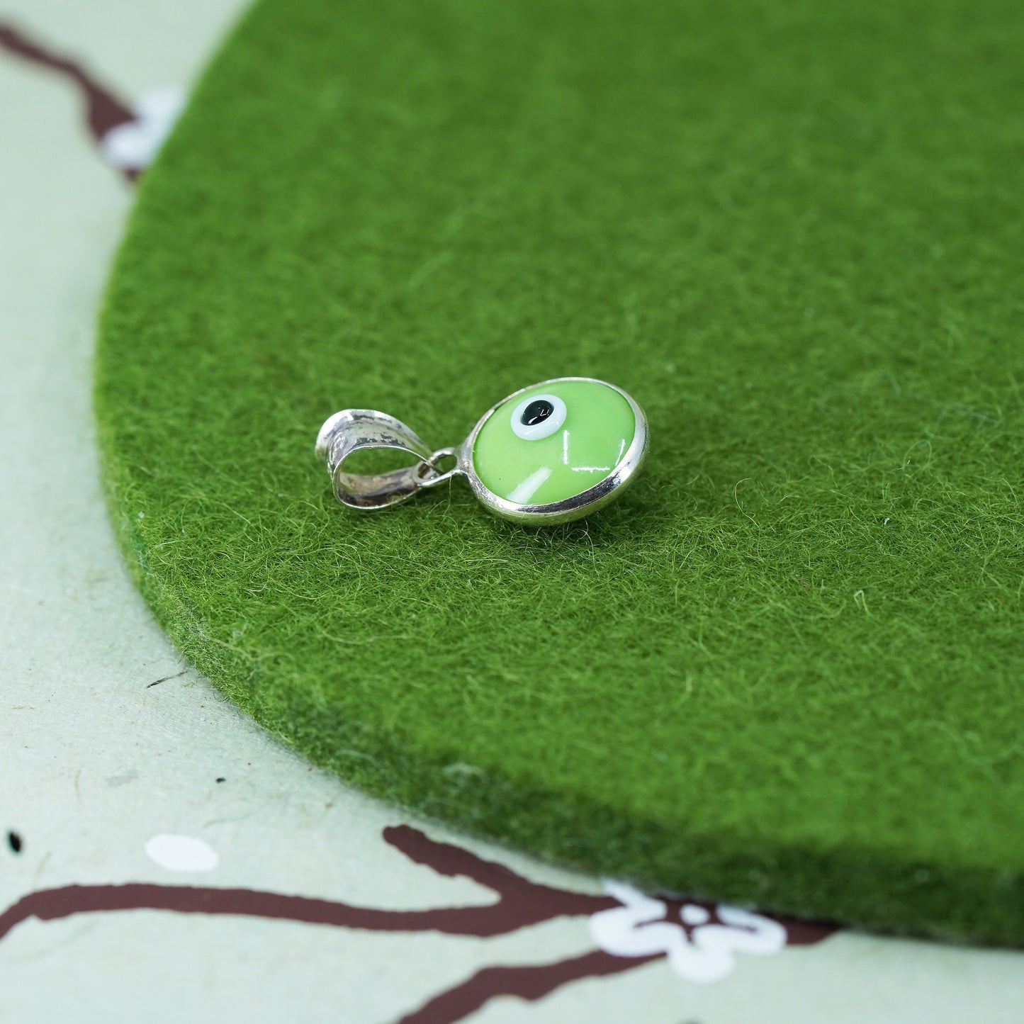 Vintage Mexico sterling silver with handmade green evil eye glass pendant
