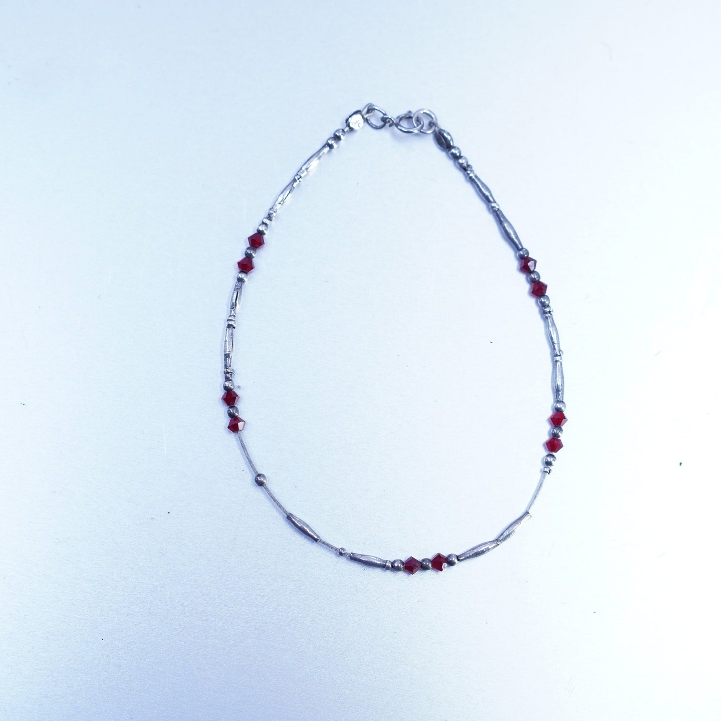 7.75”, Sterling 925 silver handmade bracelet, liquid chain with garnet charms