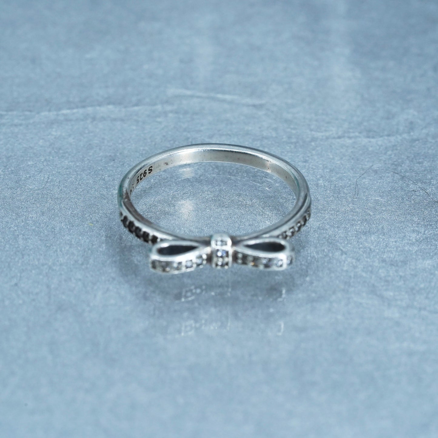Size 7.25, ALE fashionable Sterling 925 silver ribbon ring w/ cluster cz, band