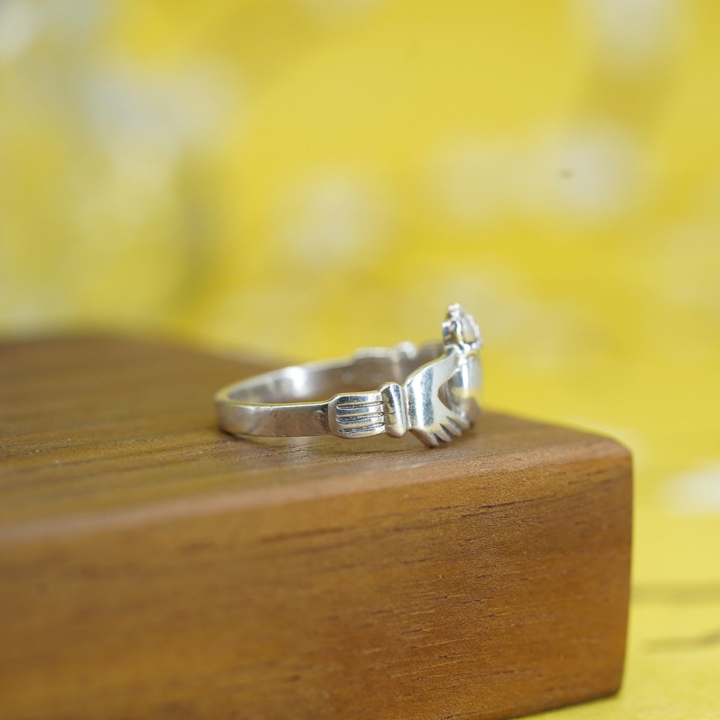 Size 8, irish sterling silver claddagh friendship ring, holding heart 925 band