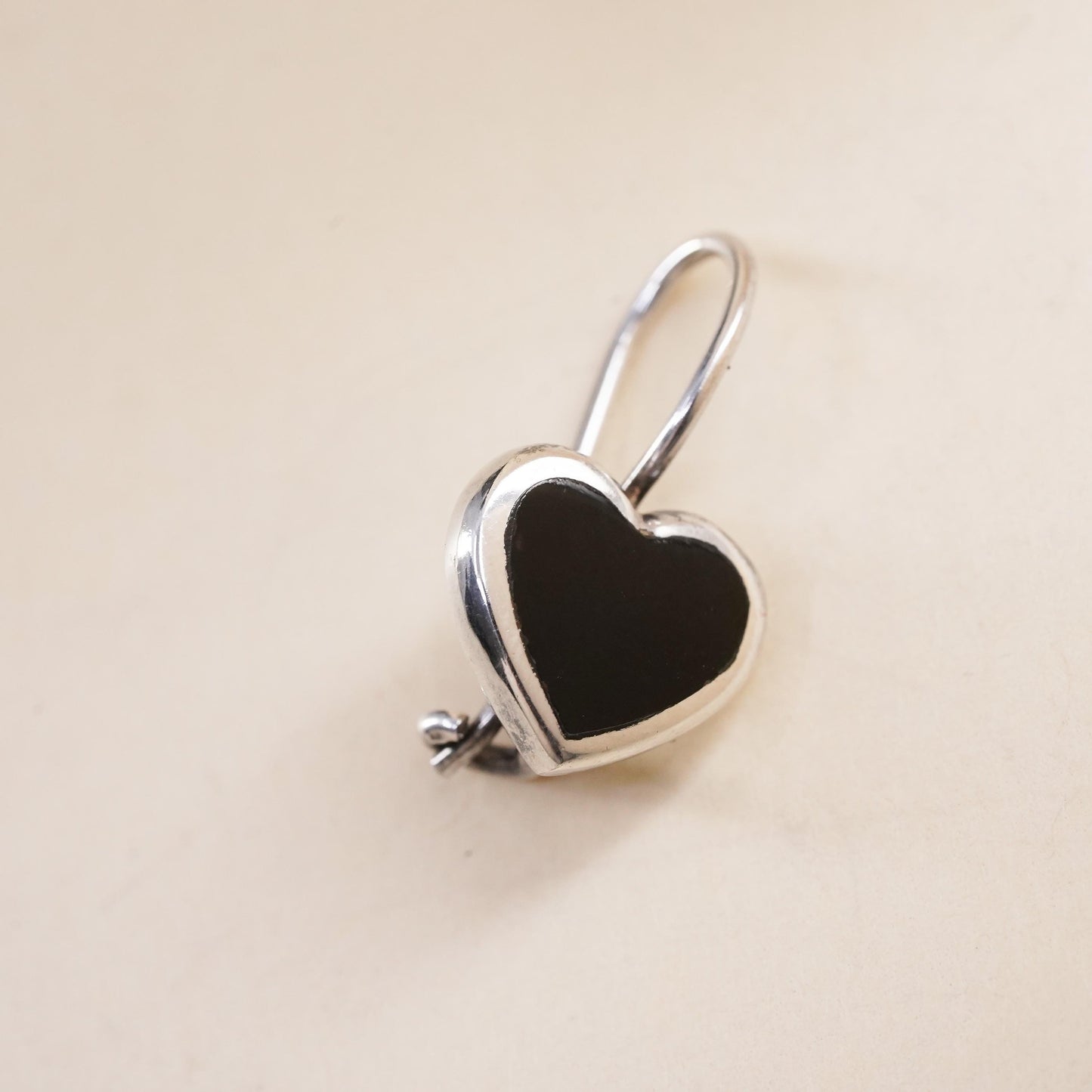 Vintage handmade single earring. Sterling 925 silver heart with onyx inlay