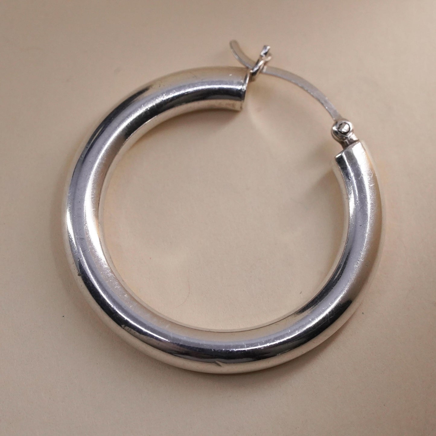 1.25” Vintage sterling silver loop single earring, textured primitive hoop