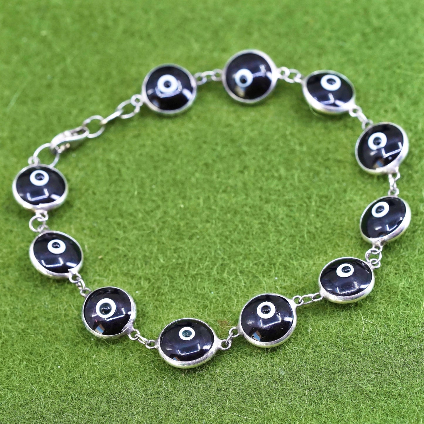 6.75”, vintage handmade sterling silver bracelet, black glass evil eye beads