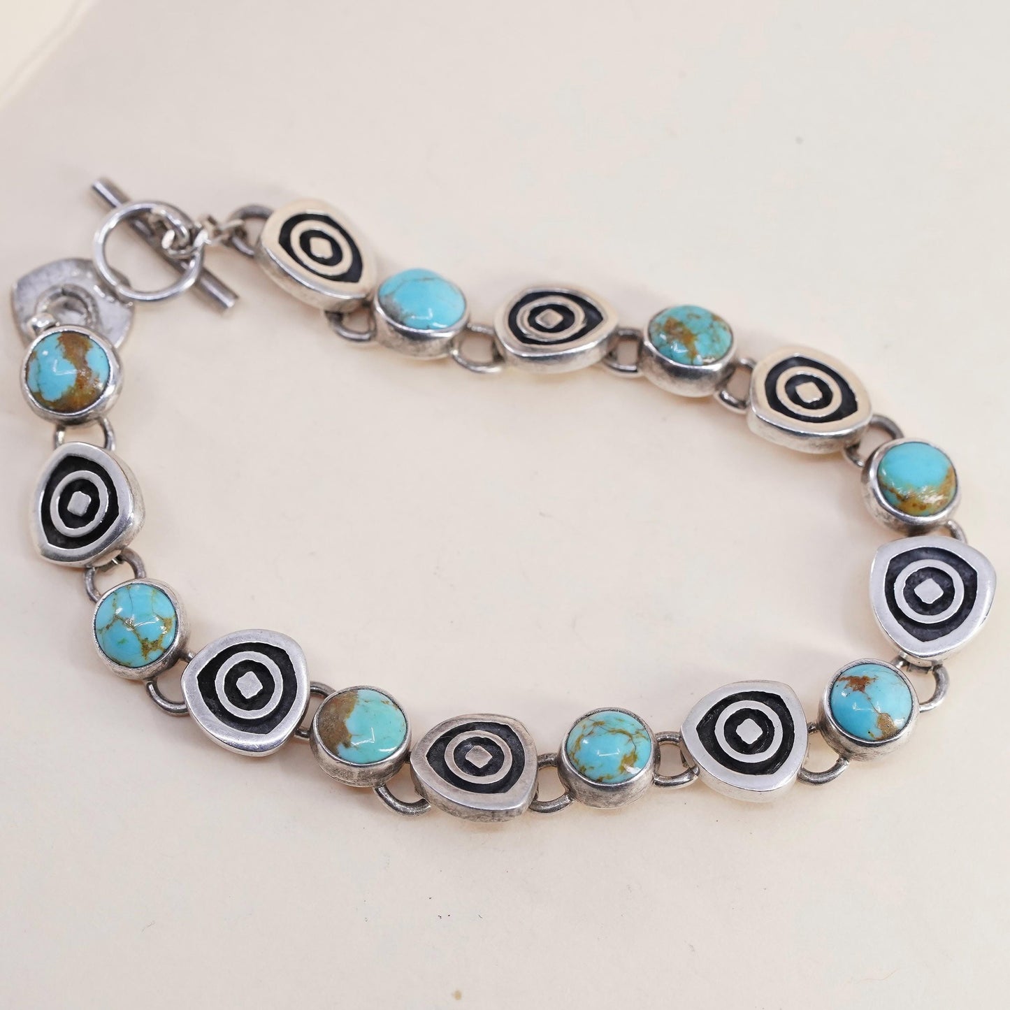 6.75”, southwestern Sterling 925 silver bracelet w/ turquoise beads and spiral