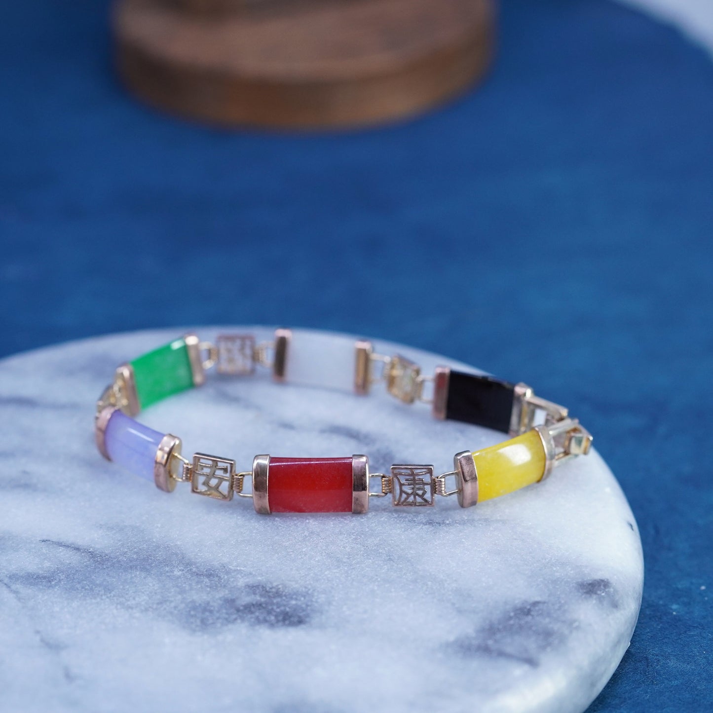 7.5”, yellow tone tennis bracelet with jade, carnelian, obsidian bar happiness