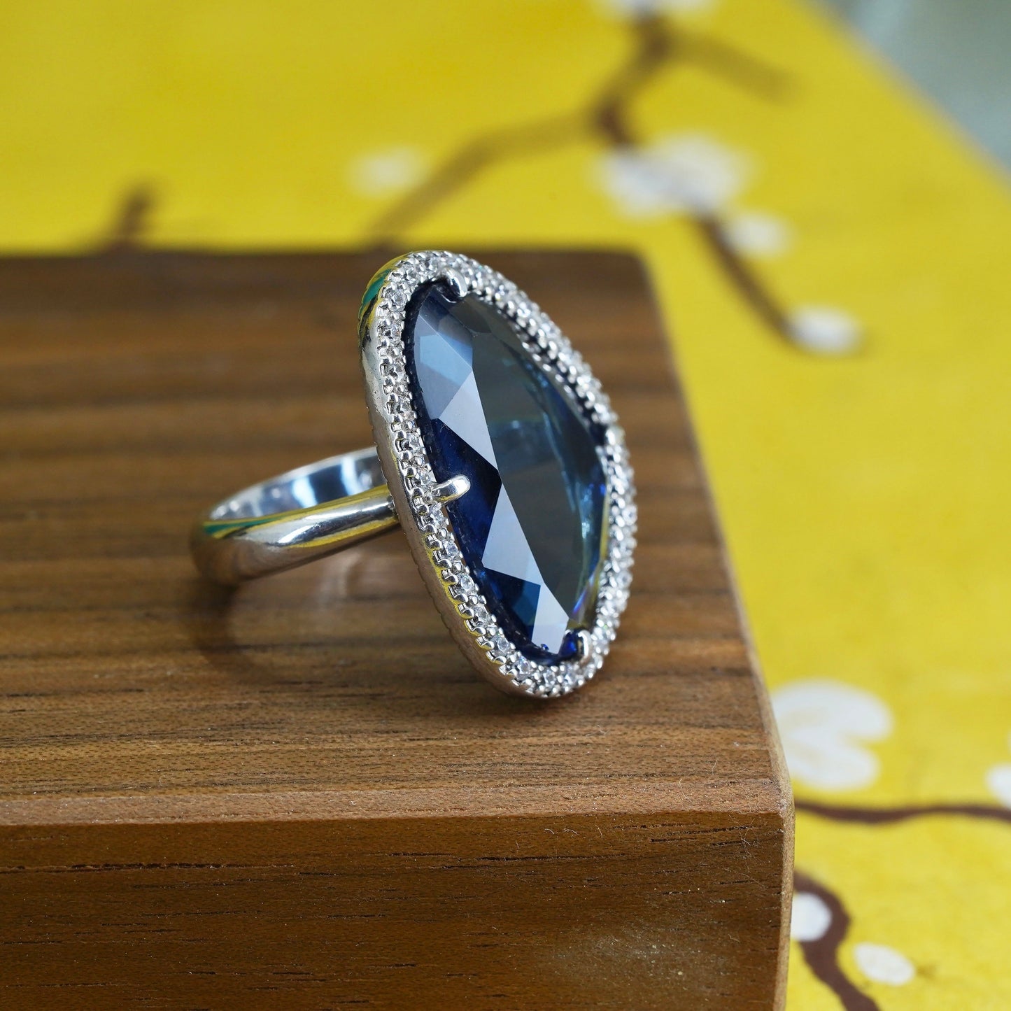 Size 7.25, vintage Sterling 925 silver ring with blue crystal and cz around