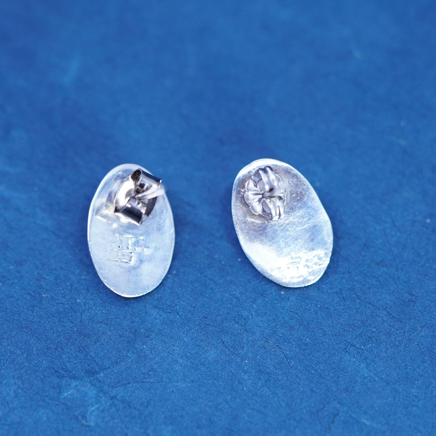 Southwestern Sterling silver earrings, 925 oval studs with coral inlay