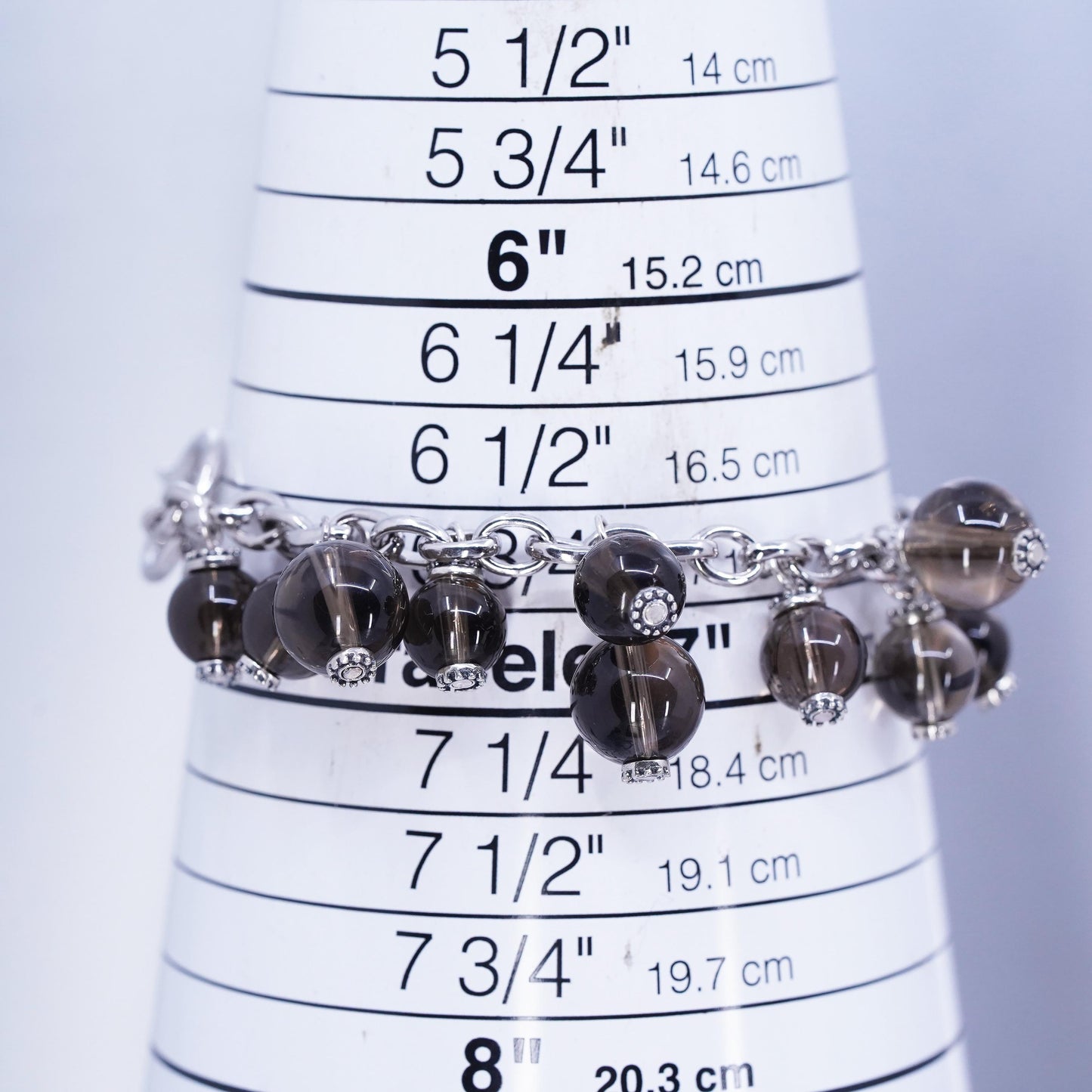 6.75”, Sterling 925 silver bracelet with smoky crystal beads and toggle closure