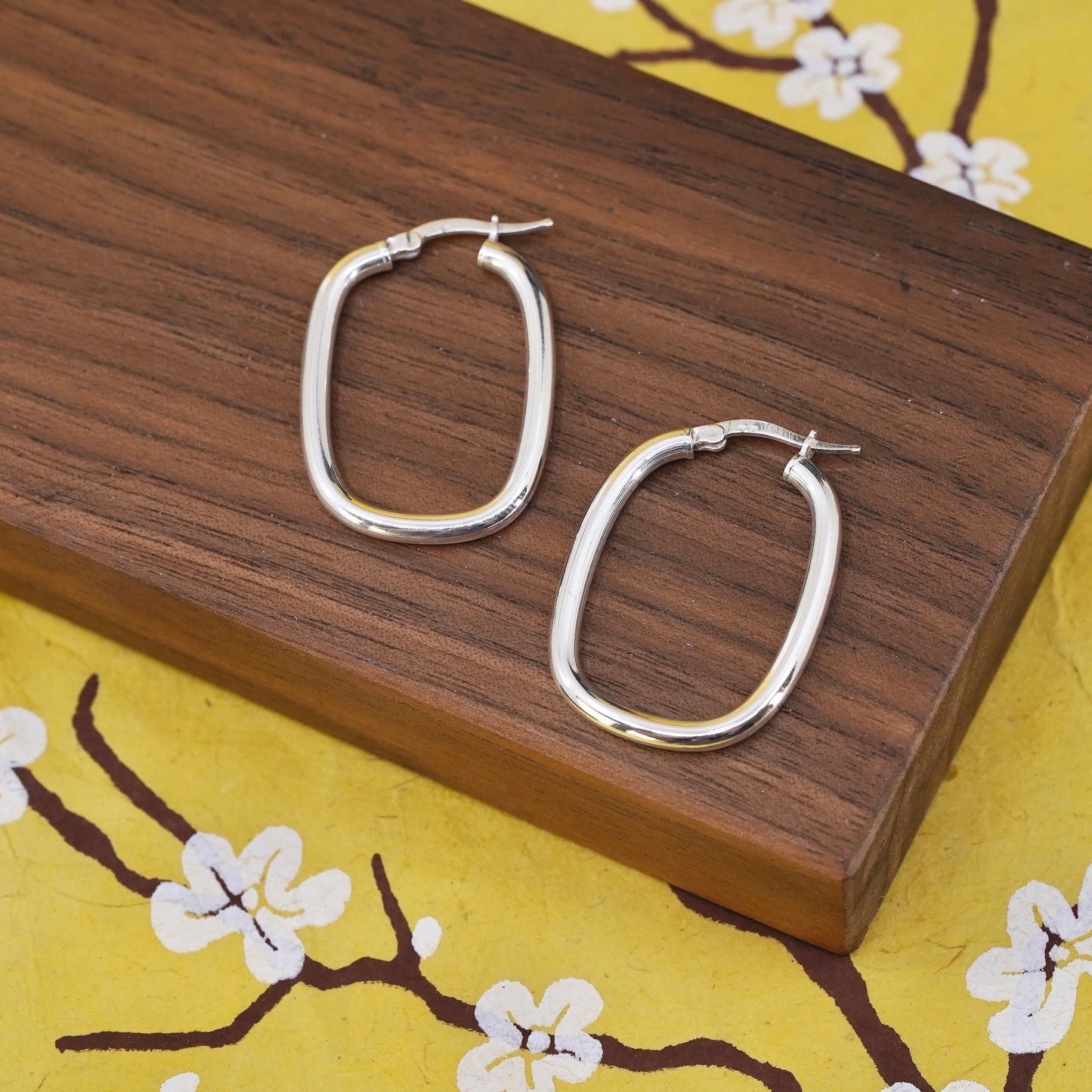 1.25", Sterling silver oval hoop earrings, textured 925 huggie