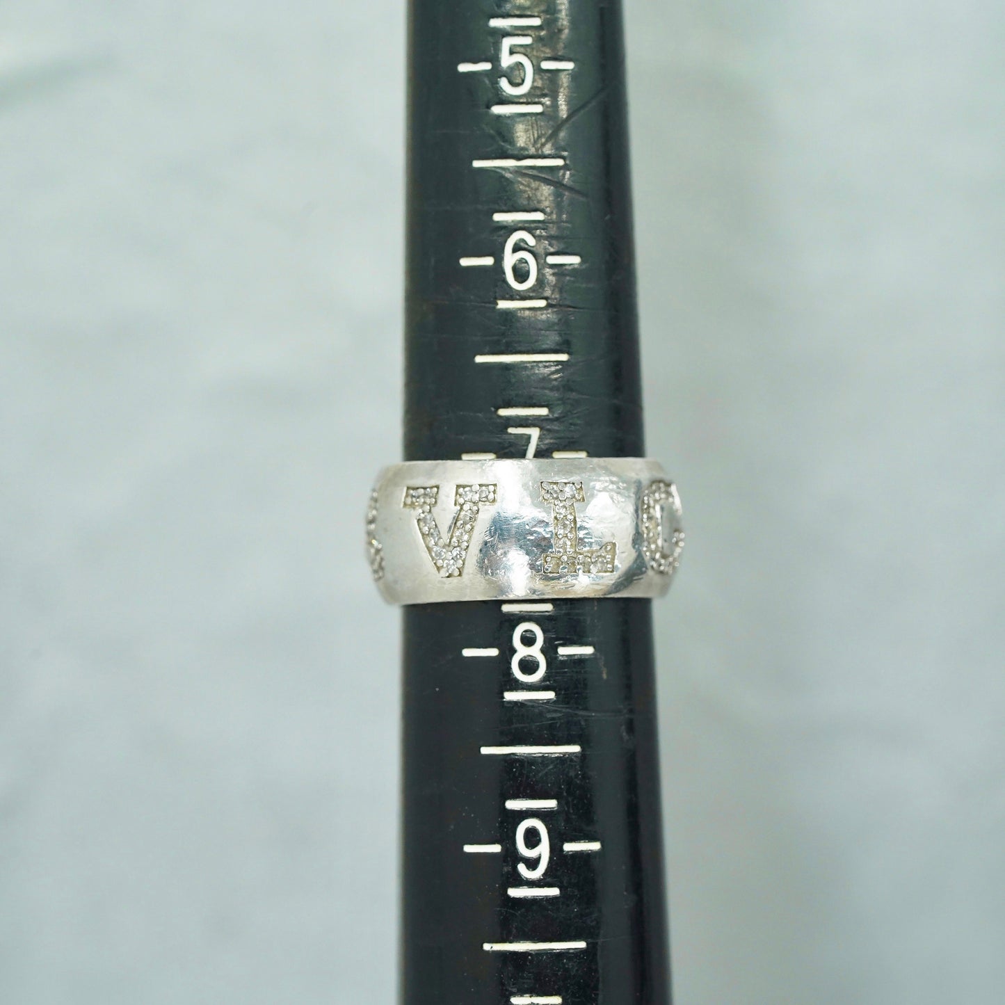 Size 7, VTG southwestern Sterling 925 silver wedding ring, Cz “bvlgari” band