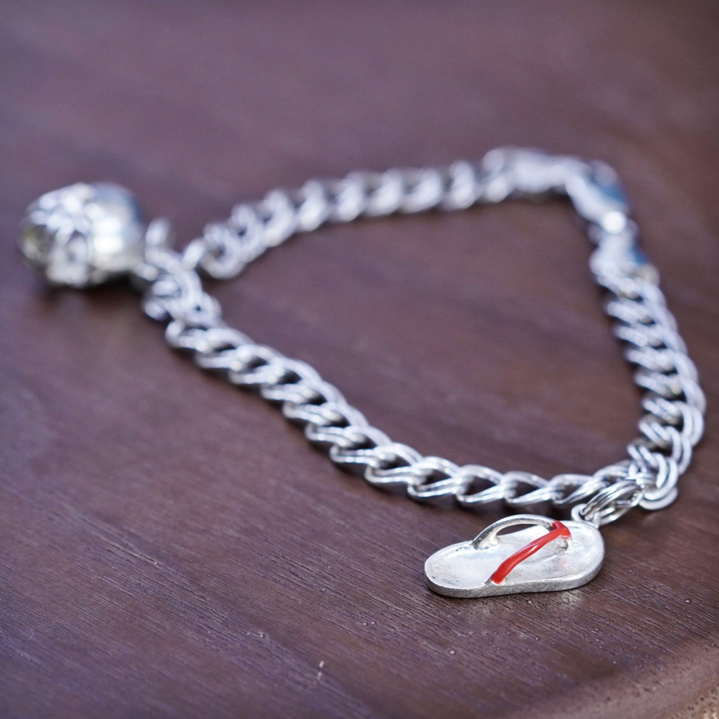 7.5”, Vtg Sterling silver 925 bracelet, curb chain football, flip-flop charms