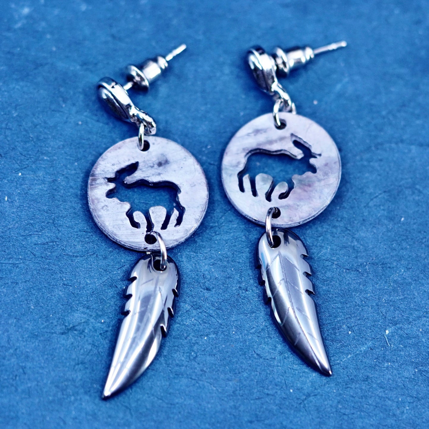 Silver Tone handmade earrings with abalone elk cut out hematite feather dangles