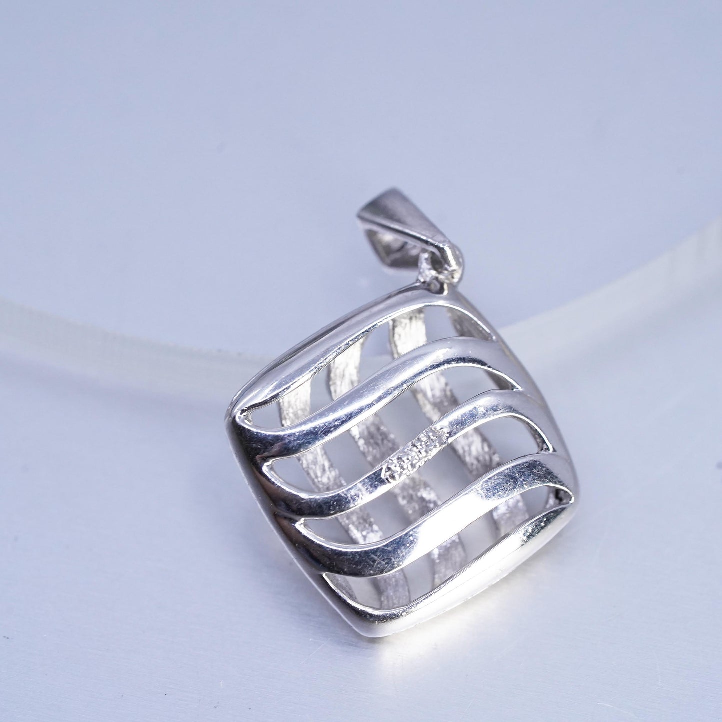 Vintage sterling 925 silver puffy wavy pendant with diamonds