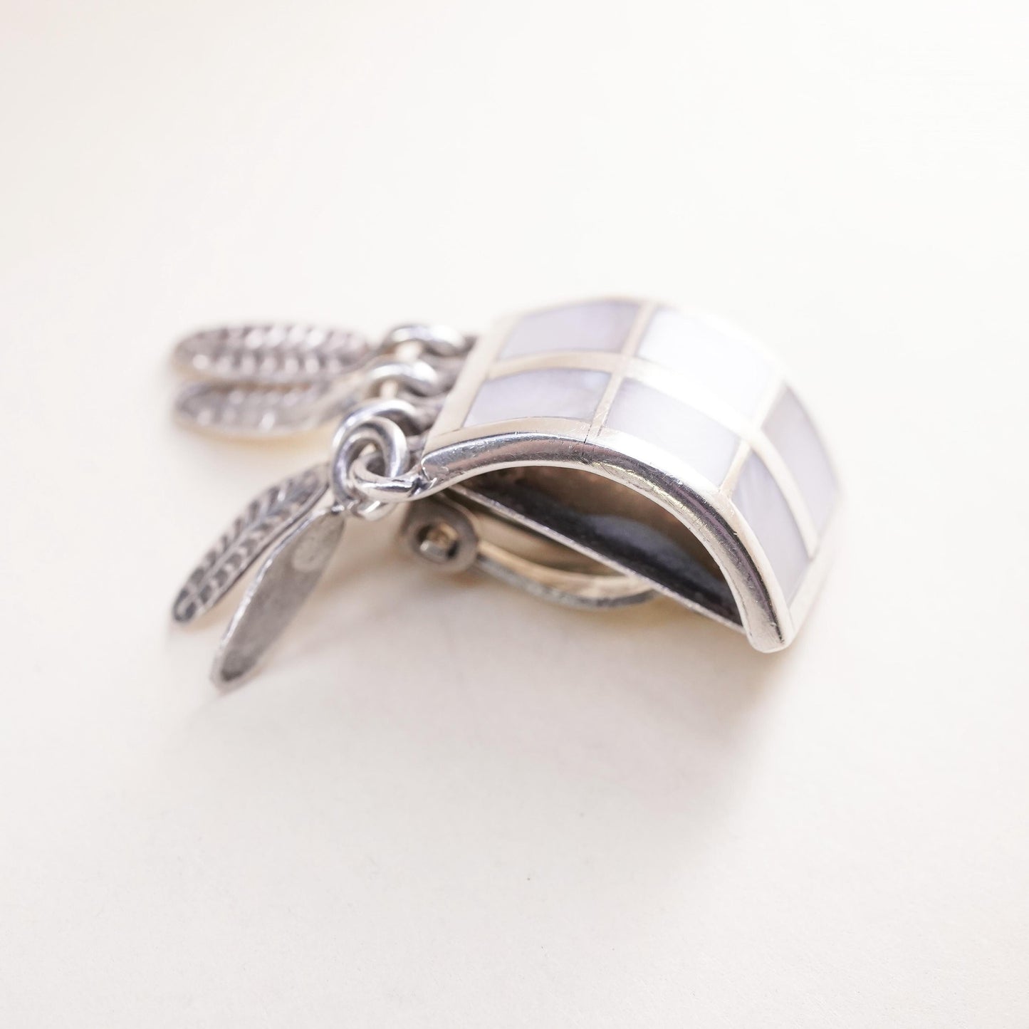 Mexican sterling silver single earring, 925 clip on w/ mother of pearl feather