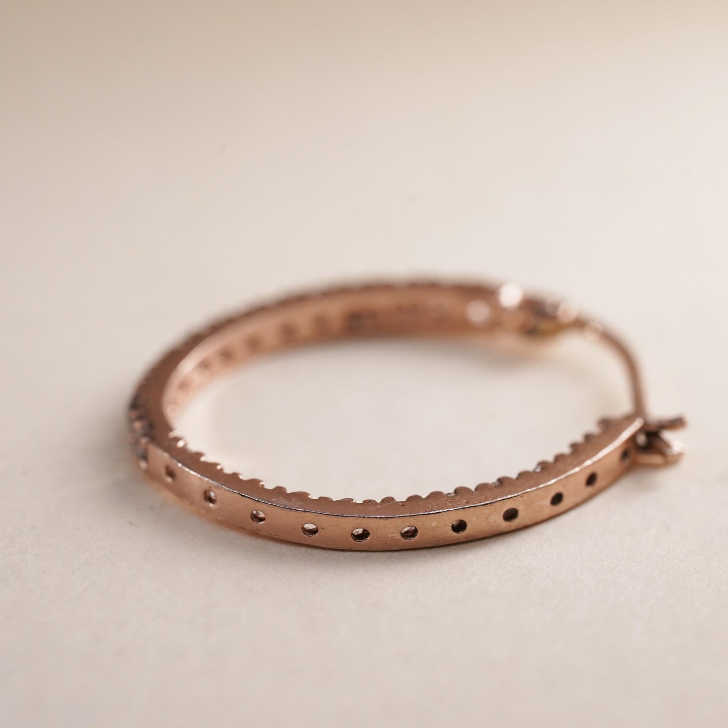 0.75", rose gold over sterling silver loop single earring, primitive hoop cz